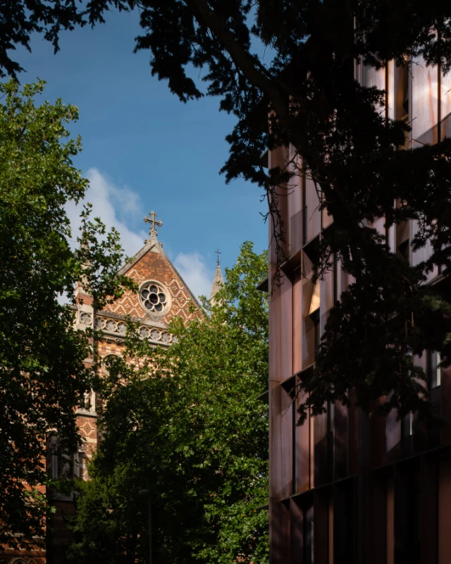 beecroft_building_close_front_view_with_trees_old_building_copper_walls3